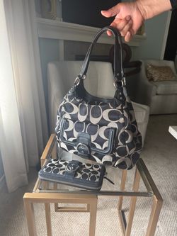 “Coach” purse and matching wallet
