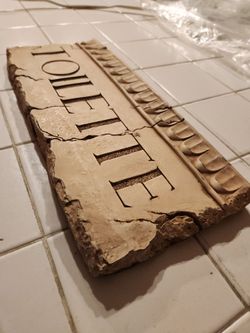 Ancient Roman Bathroom sign !