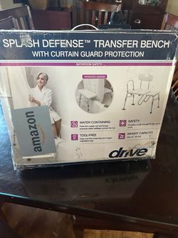 Shower chair with splash guard