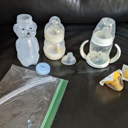 Assorted Baby Bottles And Training Cups