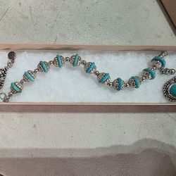 Turquoise necklace, and earrings set in silver