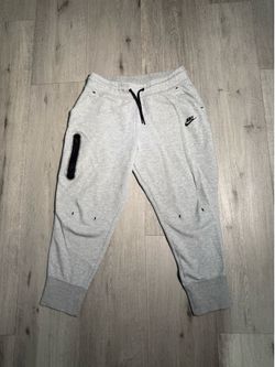 Grey Nike tech sweatpants