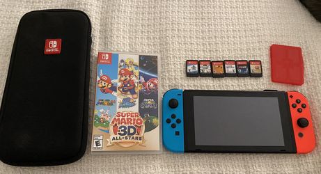 NINTENDO SWITCH WITH 6 BLOCKBUSTER TITLES