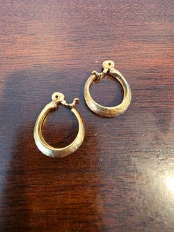Monet Style  gold-tone clip-on hoop earrings with a brushed or textured finish