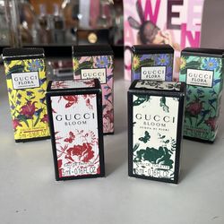 New. Mini Gucci Bloom and Gucci Flora.