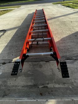 LADDER. Werner 24 ft. Fiberglass Extension Ladder (23 ft. Reach Height) with 300 lb. Load Capacity Type IA Duty Rating