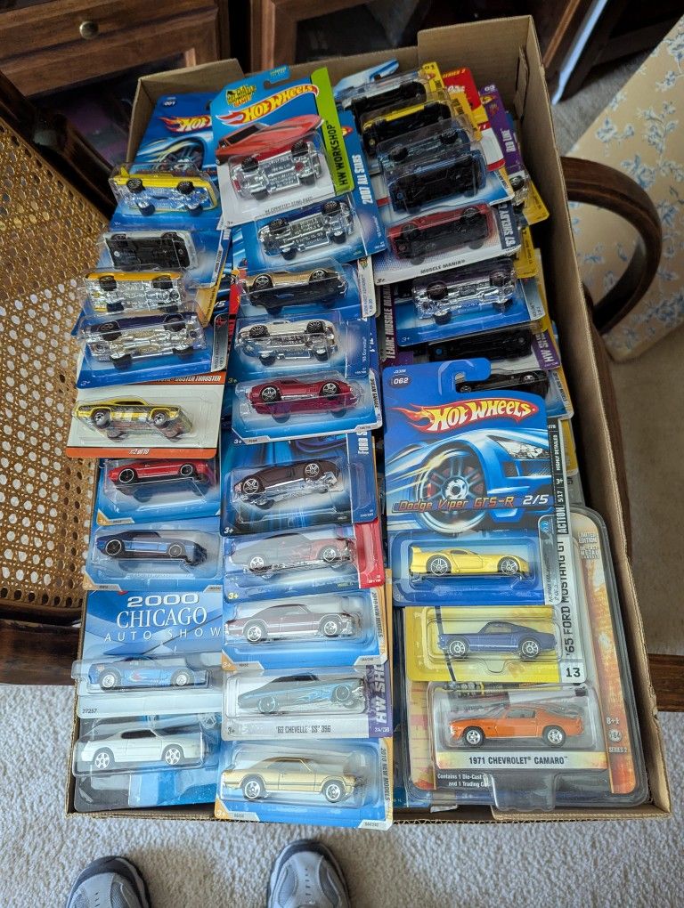 About 100 Classic Hot Wheels