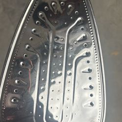 Brand new iron