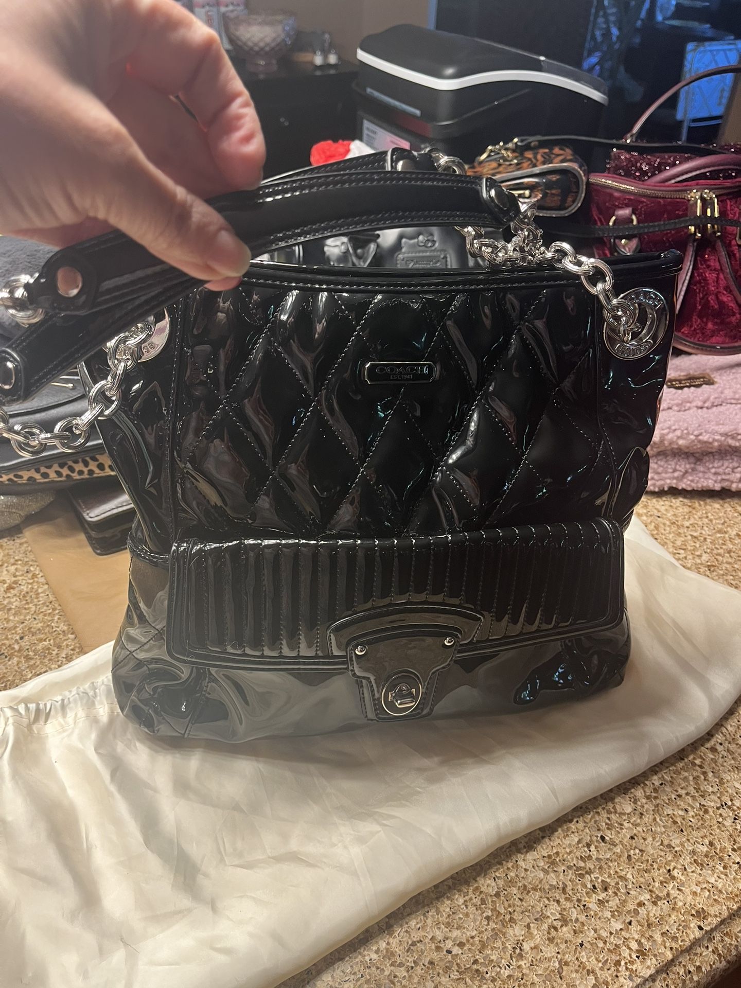 Coach Black Quilted Poppy Liquid Glass Shoulder Bag With Two Way Adjustable Strap 