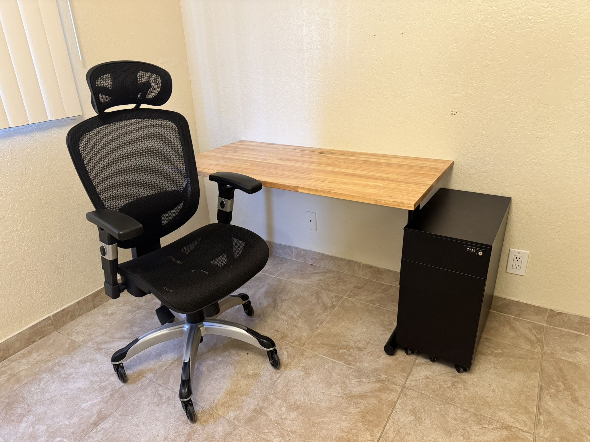 Desk, office chair and filing cabinet