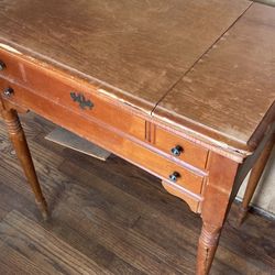 Singer model 500a sewing machine and cabinet 