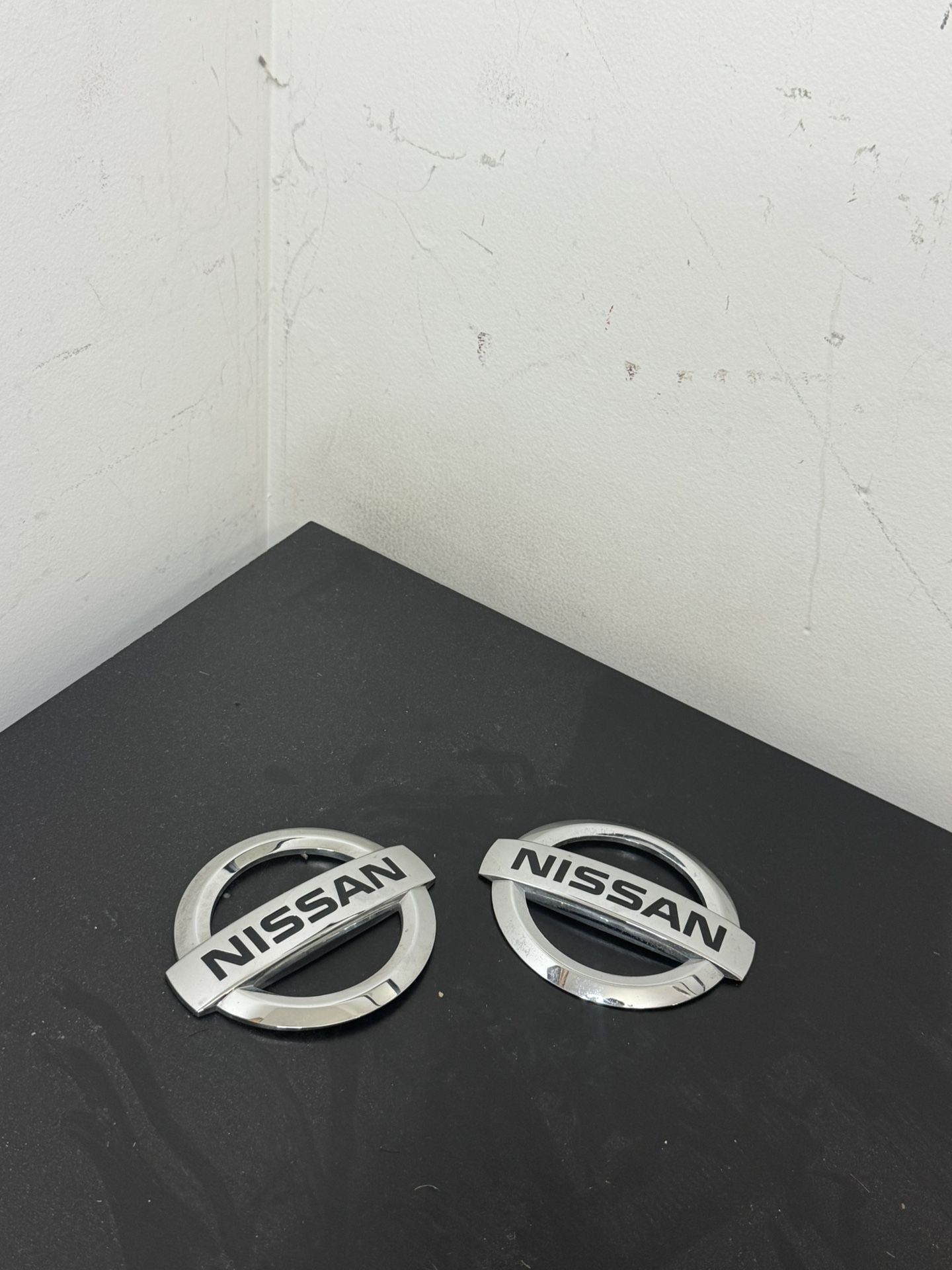 2 pieces Nissan emblems