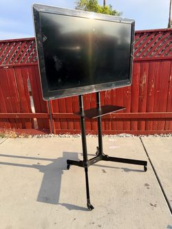 Sharp 46 in AQUOS With tv mount on wheels