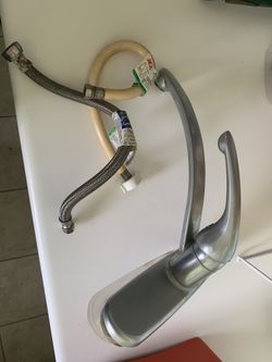 Kitchen Faucet with hoses.