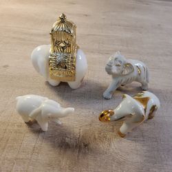 Four Vintage Elephant's. .    Size  . 4"×  3"     3"×  3" .   3"×  2" .  2"×  3" .