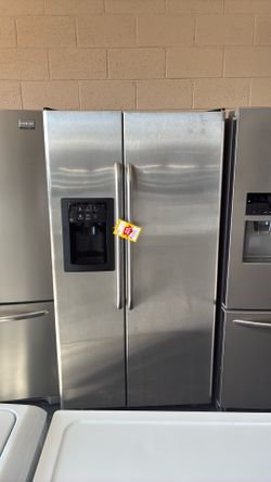 Like new GE stailenss steel side by side refrigerator