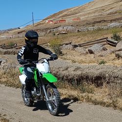 Either 2022-2023 Kawasaki 140r