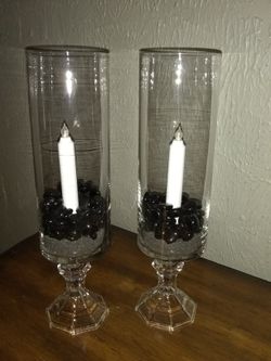 A set of glass candle holders