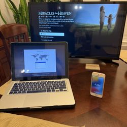 MacBook Pro, iPhone, and Samsung TV