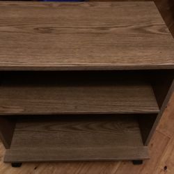 2 Shelves Brown Nightstand  / Endtable With 4 Wheels. Dimensions Are; W=24” — D=15”— H=21”.