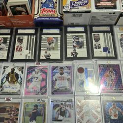 Sports cards numbered 1/1 and autos.