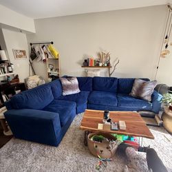 Deep Blue Pottery Barn Sectional Couch – Super Cozy and Stylish!