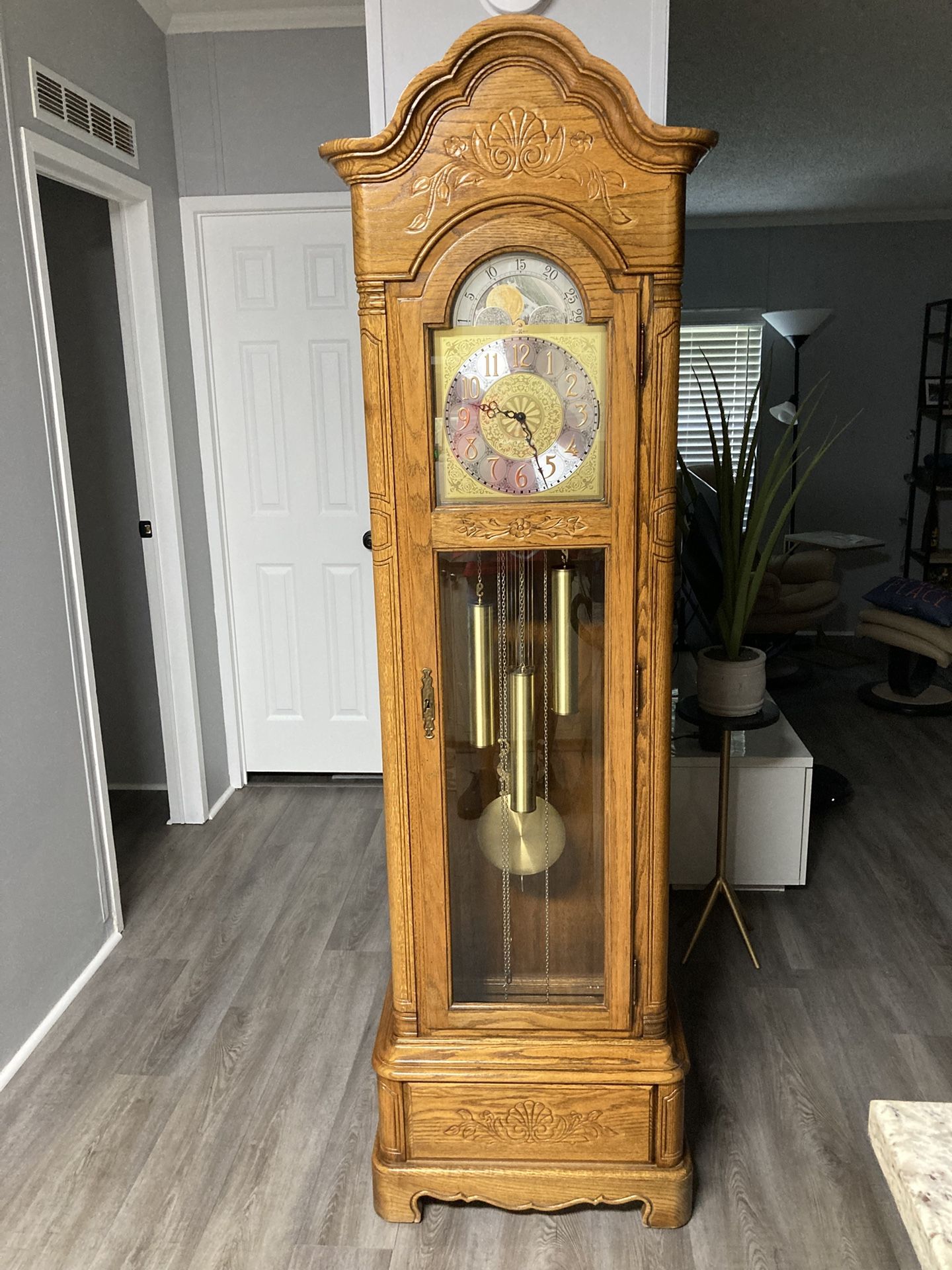 Howard Miller clock company grandfather clock