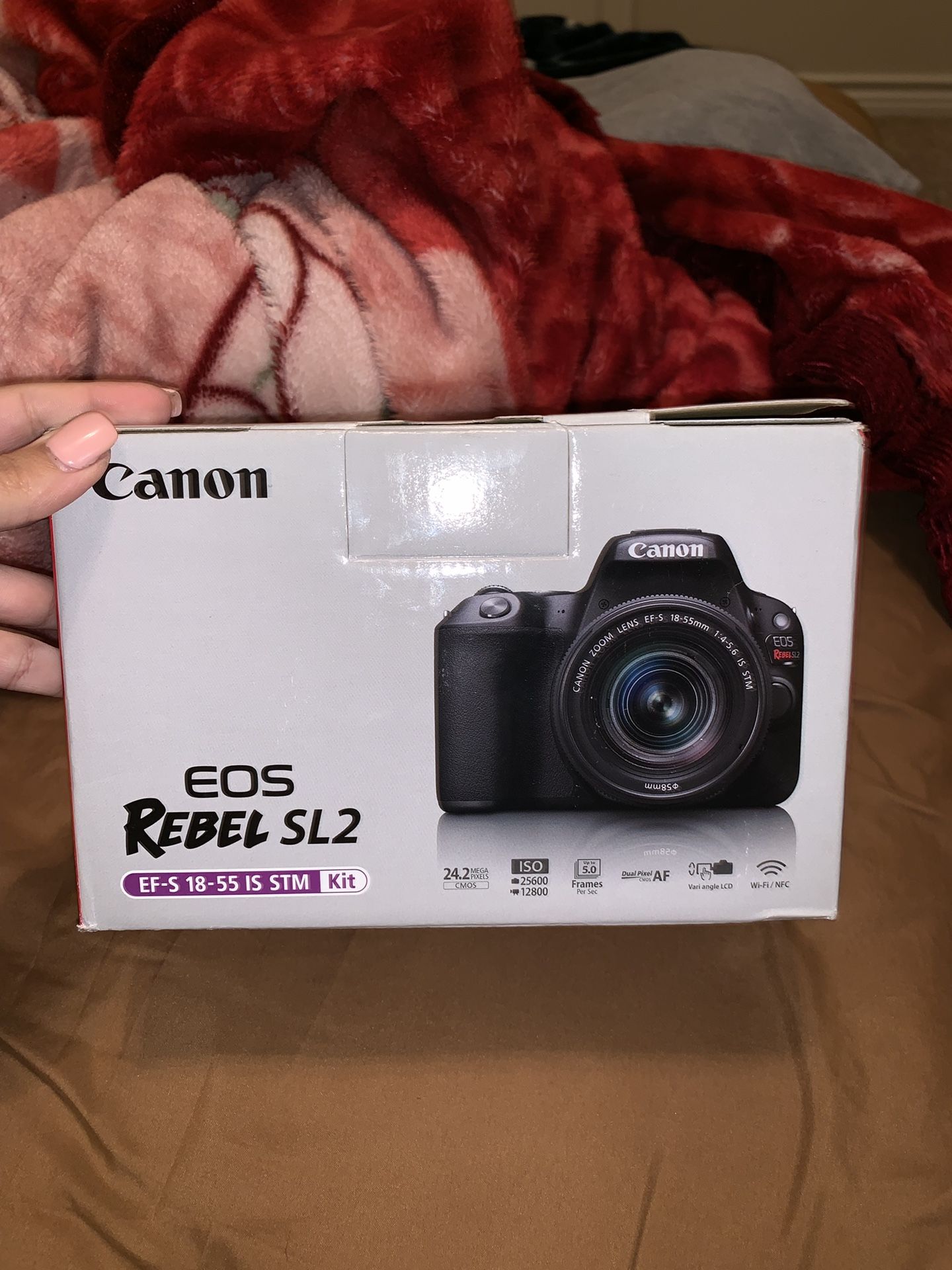 CANNON EOS REBEL SL2 basically BRAND NEW.