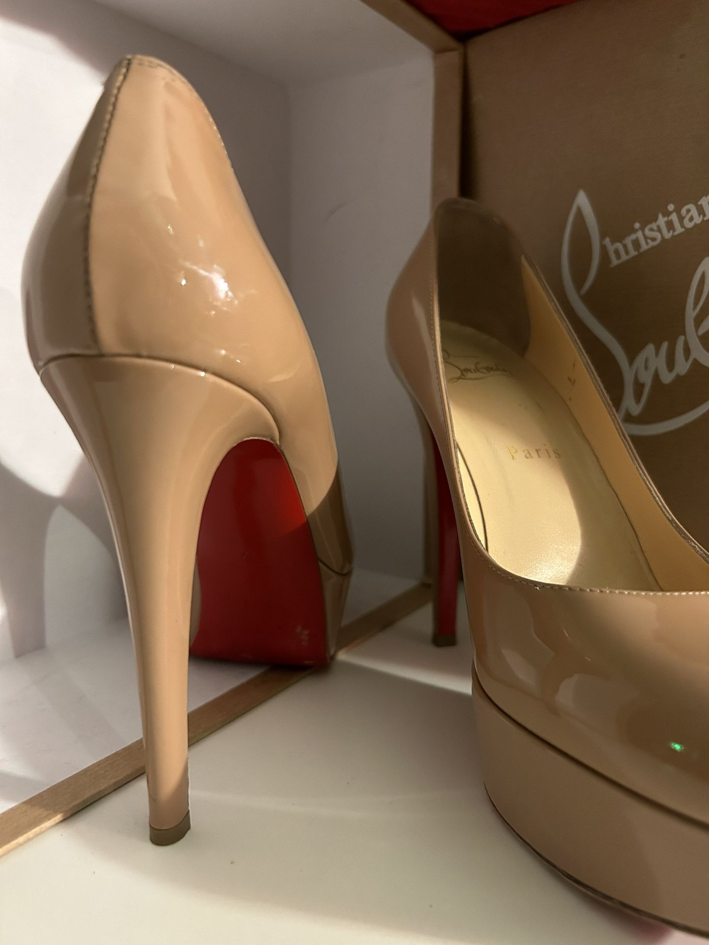 Christian Louboutin  “Red Bottoms” “ Bloody Shoes”