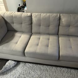 Selling my beige L-shaped sectional!