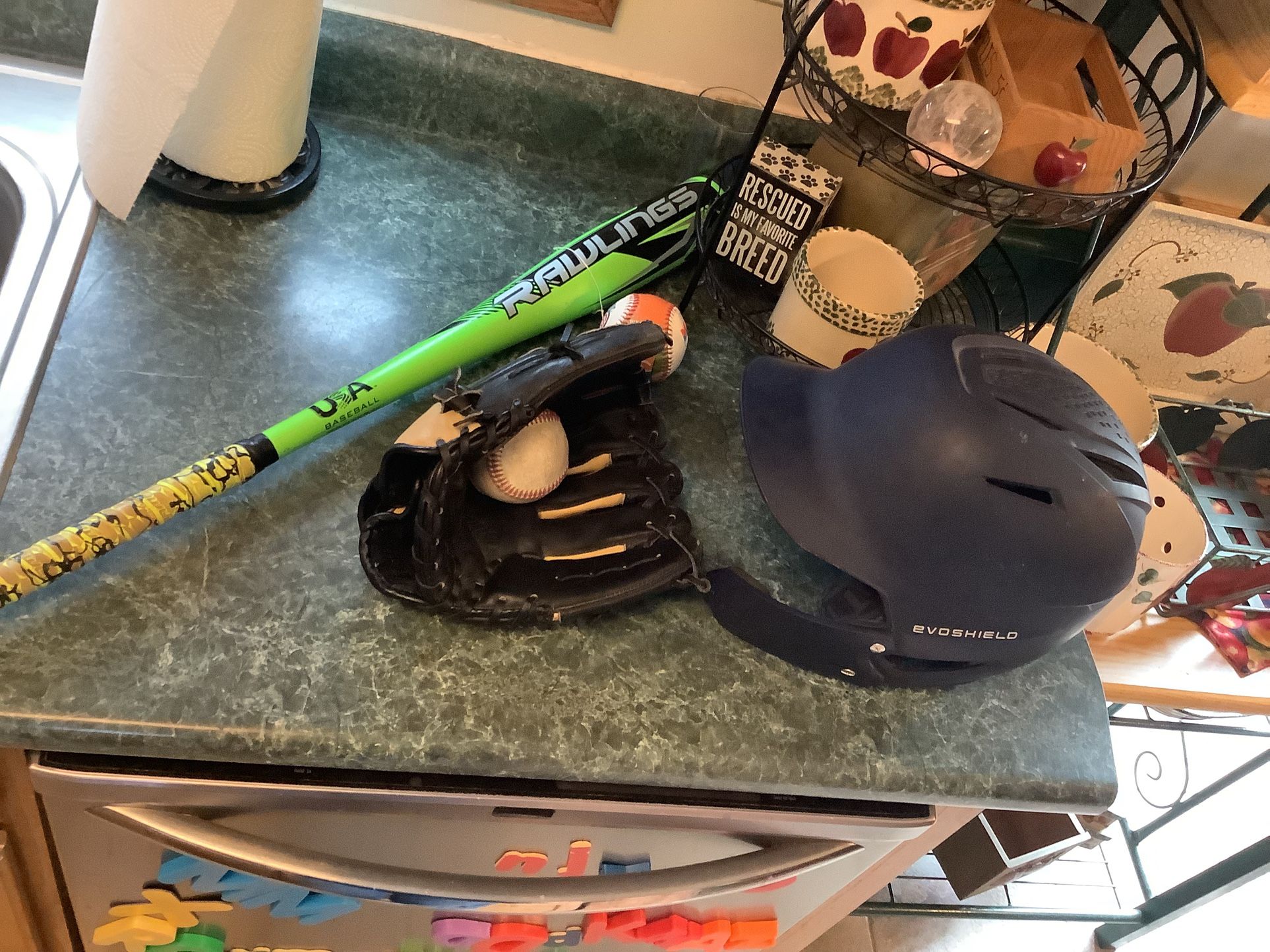 Baseball package including Nike Keystone 12” baseball glove, Rawlings Fuel USA Baseball 29” 21 ounces model Fuel 2 5/8” barrel Evoshield batting hel