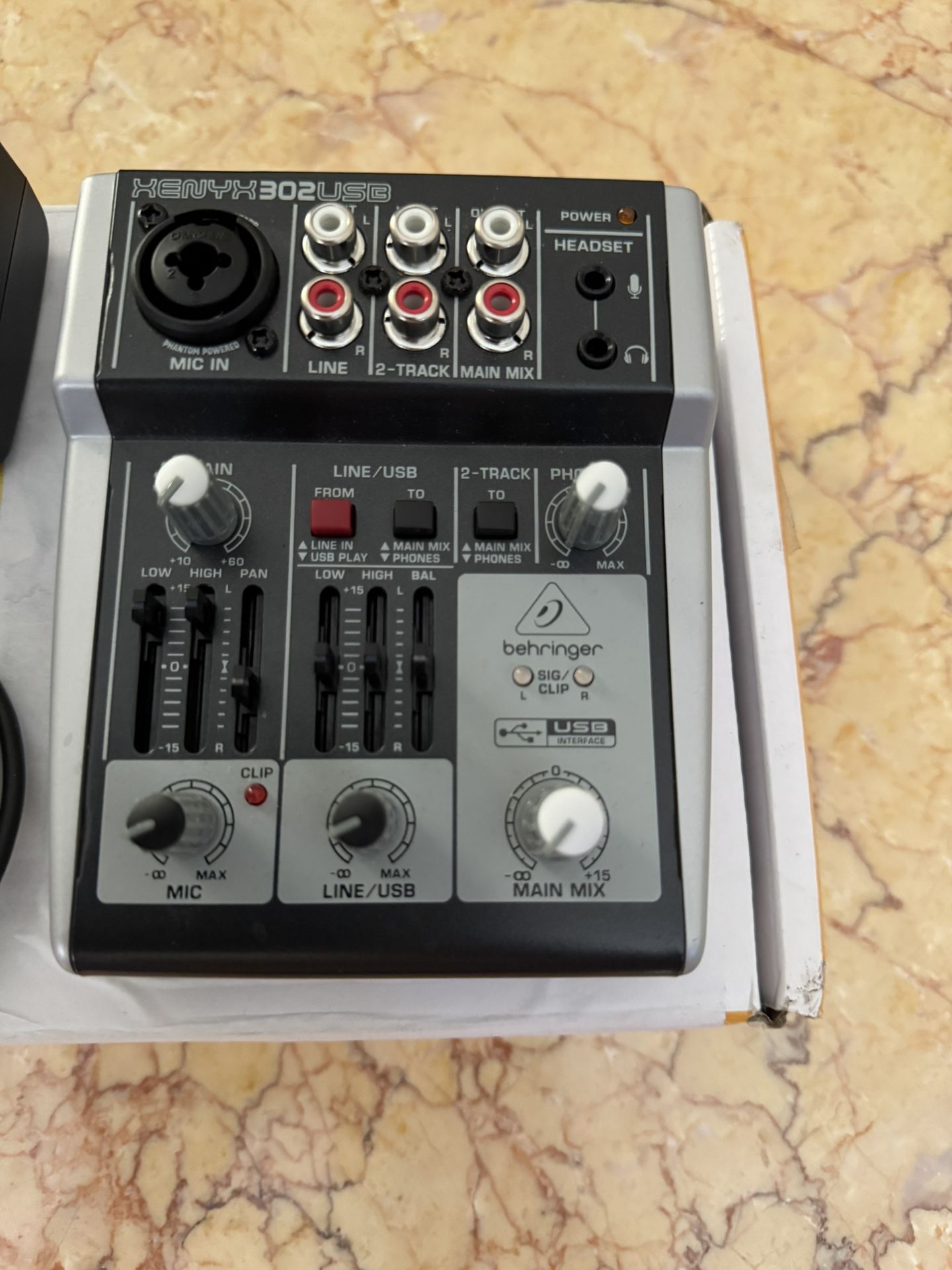 Behringer mini audio, digital mixer open box. See photo for details