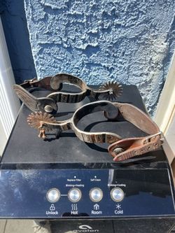 Western-style cowboy spurs