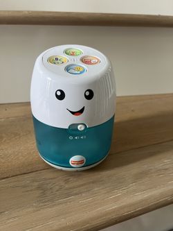 Fisher-Price Laugh & Learn Babble & Wobble Hub, Interactive Pretend hub Toy with Music