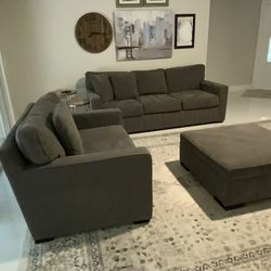 Gray Full Size Couch, Oversized Chair That Converts To Bed, Rolling Storage Ottoman - MOTIVATED TO SELL; PICK-UP SATURDAY