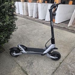Brand New Dual Motor Electric Scooter/Helmet
