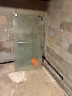 Bathtub sliding doors and hardware