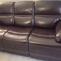 Selling a brand new Top-Grain Leather Power Reclining Sofa with Power Headrest from Raymour & Flanigan.