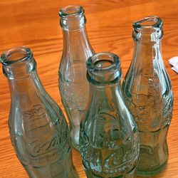 4 Old Coke Bottles 