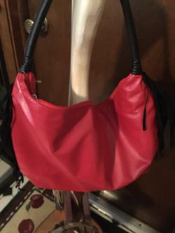 Red shoulder bag with fringe