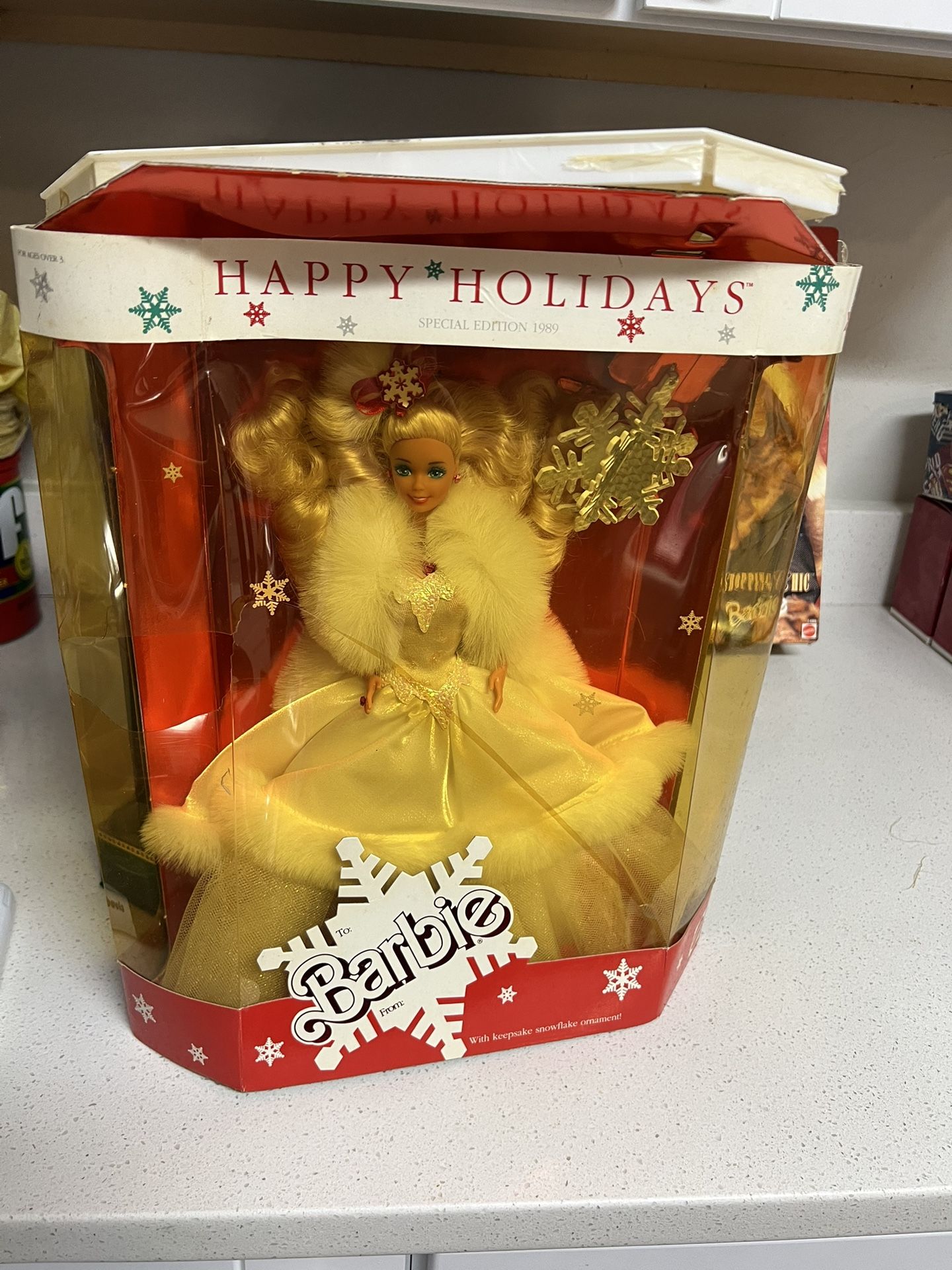 Mattel 1989 Special Edition Happy Holidays Barbie doll. It is the second doll in the Happy Holidays series, which began in 1988. The doll wears a wh