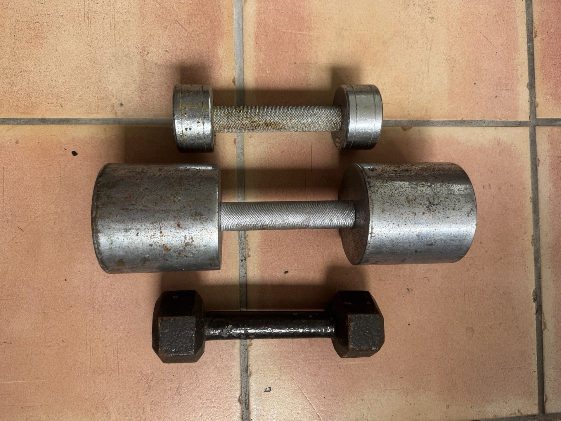 Dumbbells. 2-5lbs and 1-25lbs for a total of 35lbs