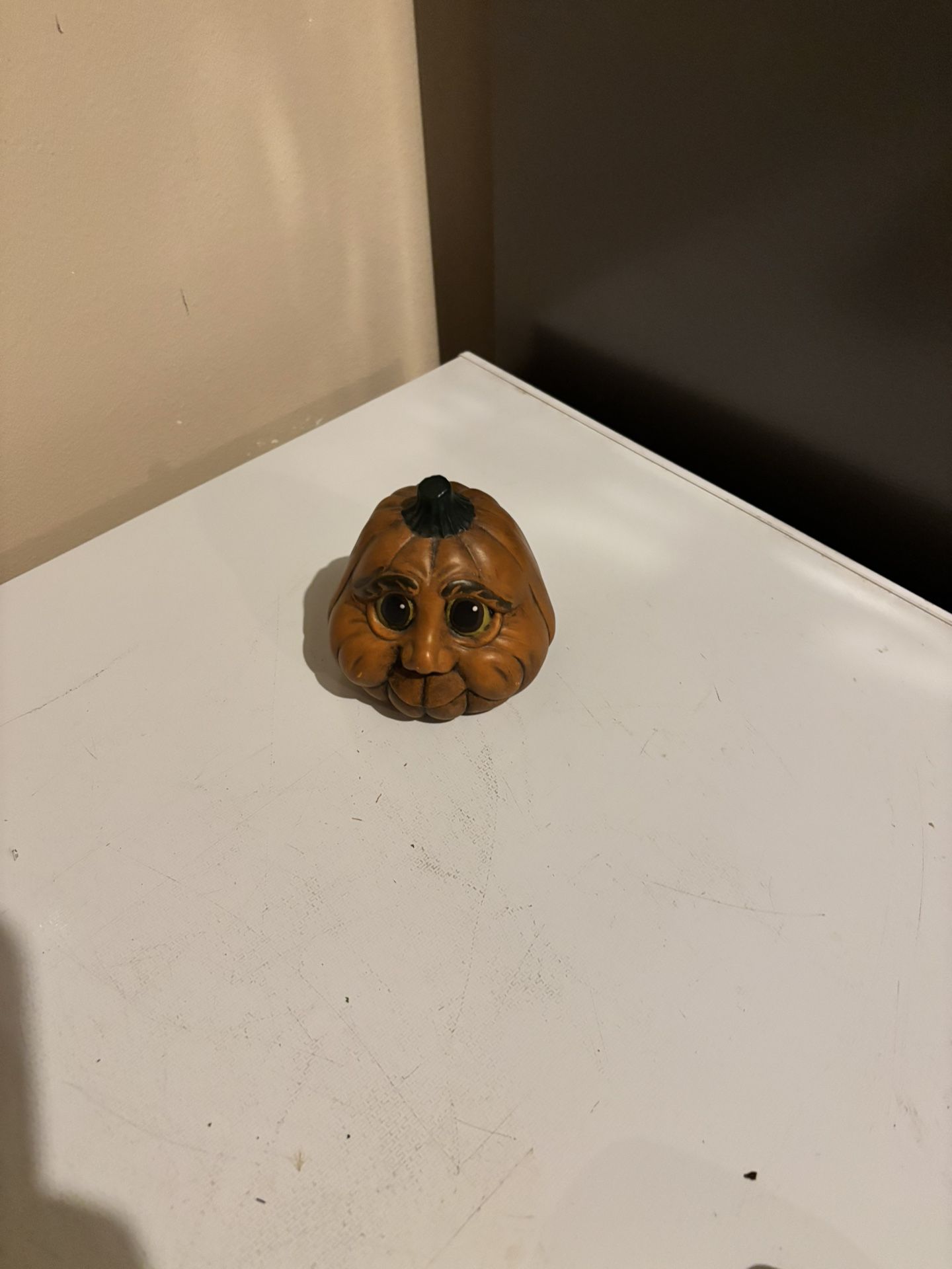 Hand painted ceramic pumpkin face