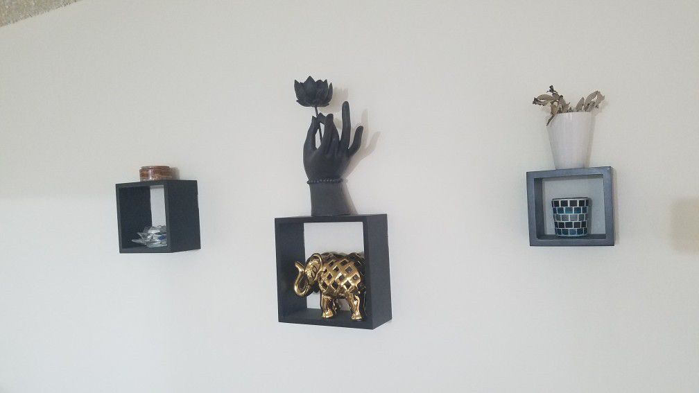 Wall decor, small shelves, candle holders