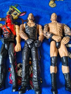 11 inch wwe/wwf action figures Kane , Undertaker, and Randy Orton