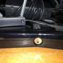 Xbox 360 S System With A One Wireless Controller And The Power Cable And RCA Cable And Two Sensors And One Game 