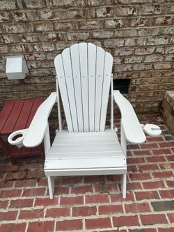 Very heavy foldable resin white Adirondack chair