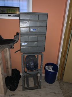 Adrian steel shelves with drawers and HVAC cylinders holder