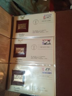 Golden replicas of the United States stamps proof replicas on the gleaming surface of 22Kt gold 118 first day issue gold stamp with original stamp mak