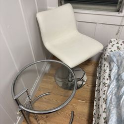 Swiveling Chair And Adjustable End Table